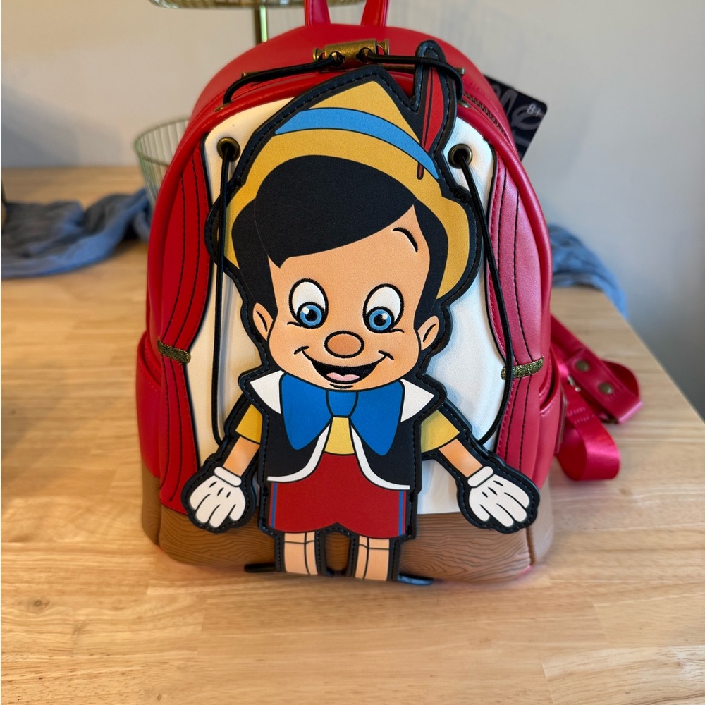 Disney Loungefly Pinocchio Backpack - Picture 1 of 9
